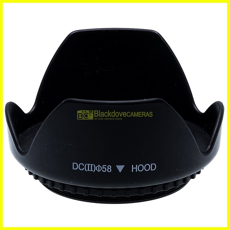 “58mm. paraluce a corolla universale, innesto a vite. Ruotabile. Lens hood.”