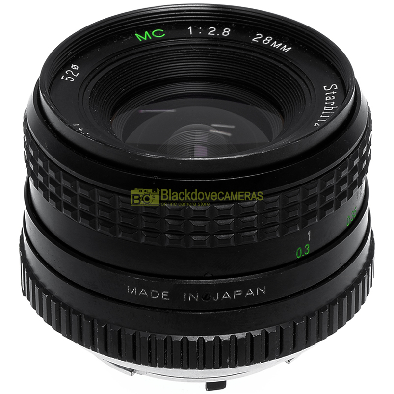 Starblitz Auto 28mm. Objectif grand angle f2.8 pour appareils photo Minolta MD