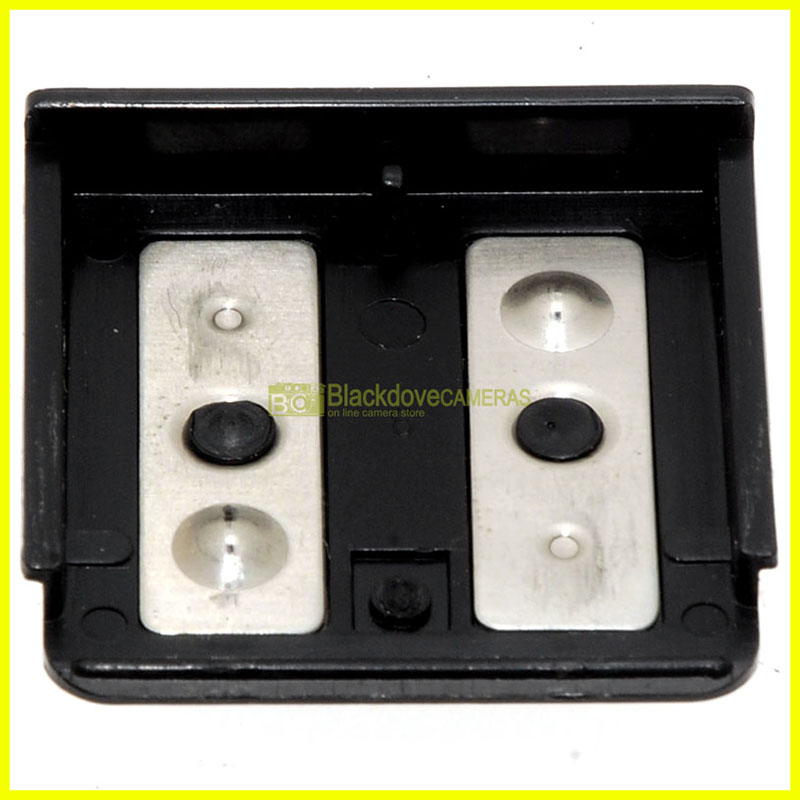 Sportello batterie per flash Minolta Auto 25. Battery door. Used.