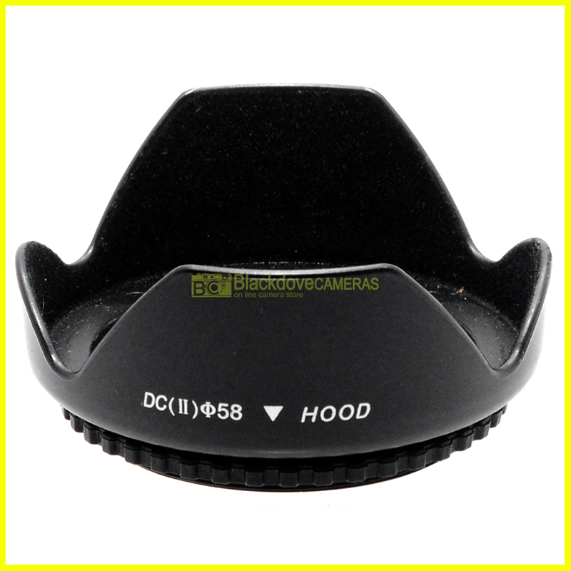 “58mm. paraluce a corolla universale, innesto a vite. Ruotabile. Lens hood.”