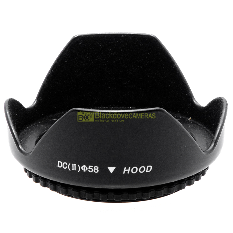 “58mm. paraluce a corolla universale, innesto a vite. Ruotabile. Lens hood.”