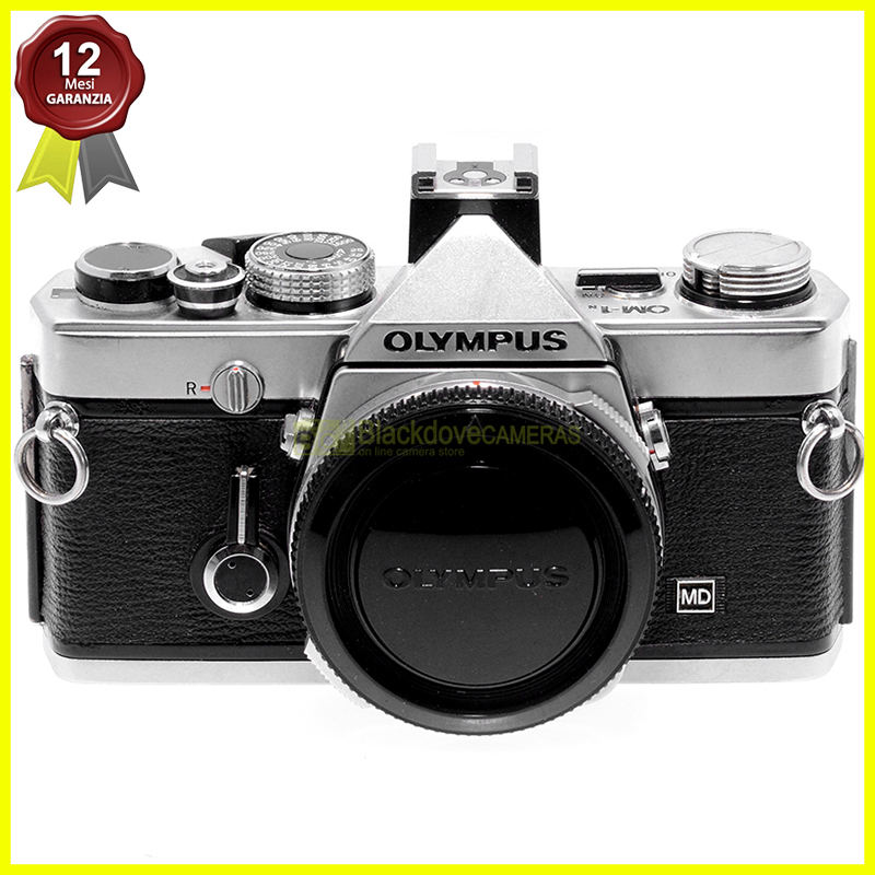Olympus OM-1 body silver. Fotocamera reflex meccanica a pellicola.