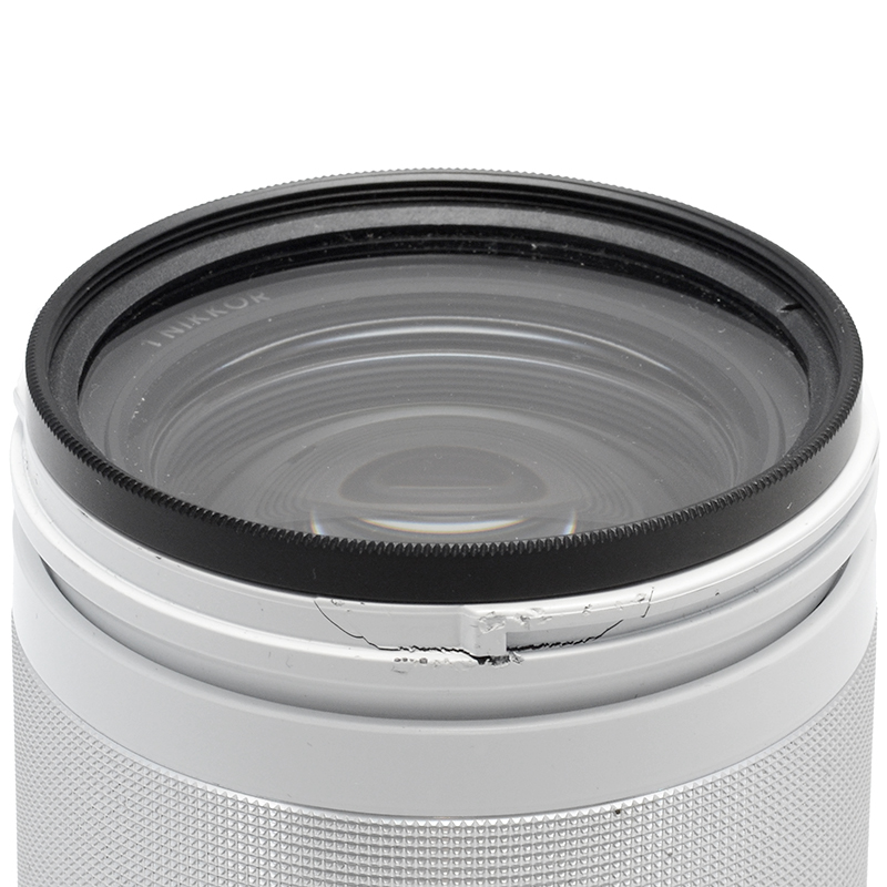 Nikon 1 Nikkor 10-100mm f/4-5.6 VR Zoom Bianco con Filtro UV dettagli estetici
