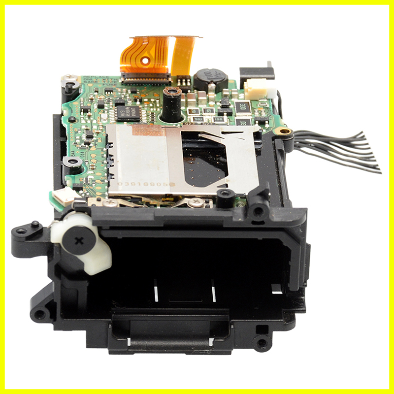 Canon EOS 500D vano batterie e slot SD vista frontale
